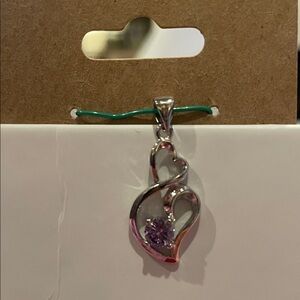 Elegant Silver Heart Pendant with Purple Gemstone